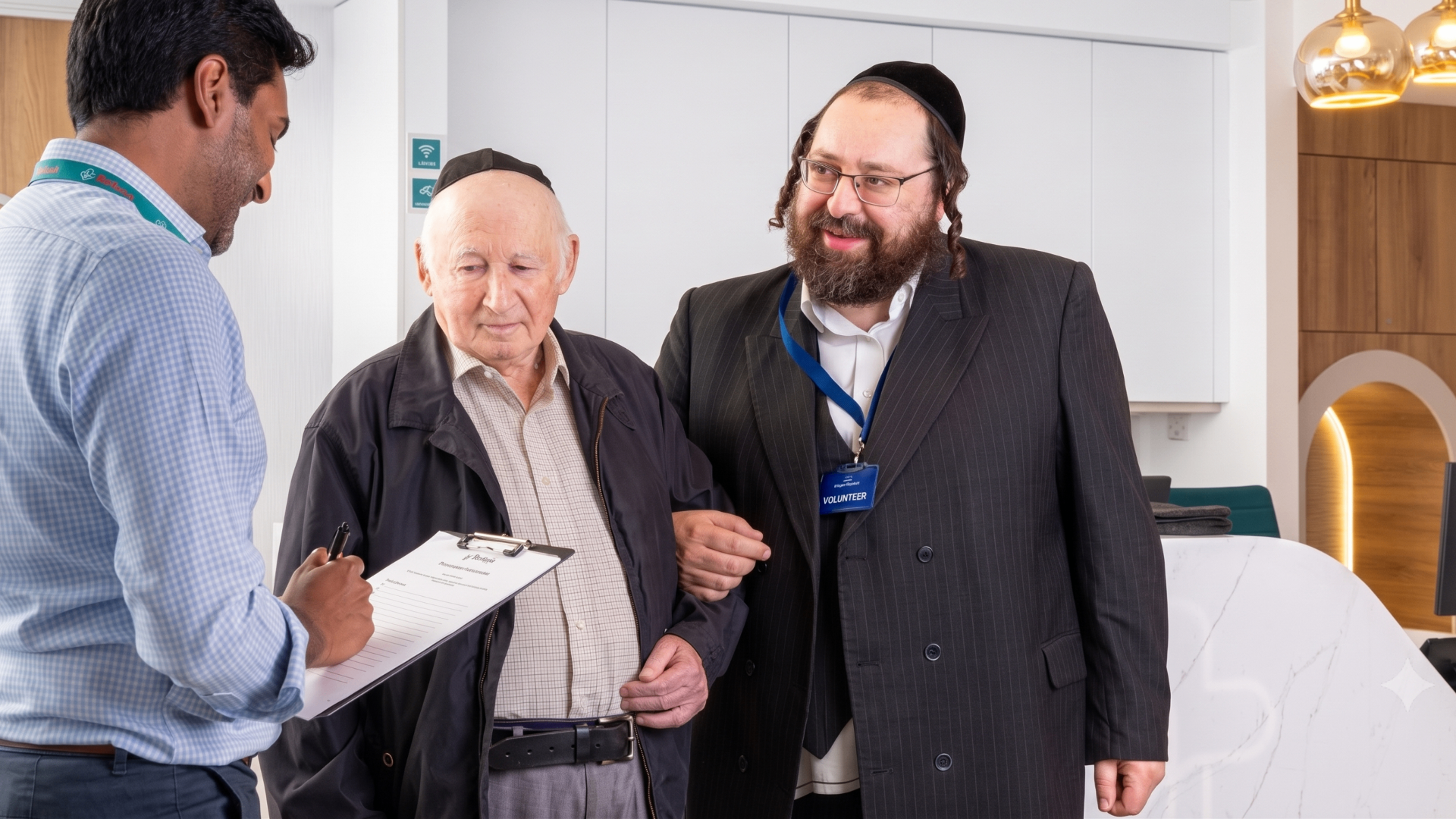Bikur Cholim volunteer supporting an elderly man
